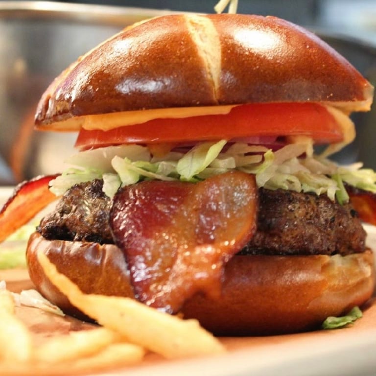 Indulge in Our Bacon Avocado Burger