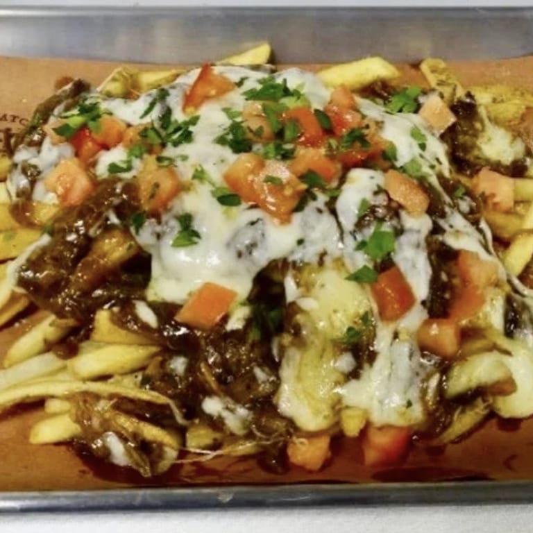 Indulge in Our Poutine